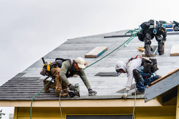 Professional Gutter Installation technician working in Bradford, RI